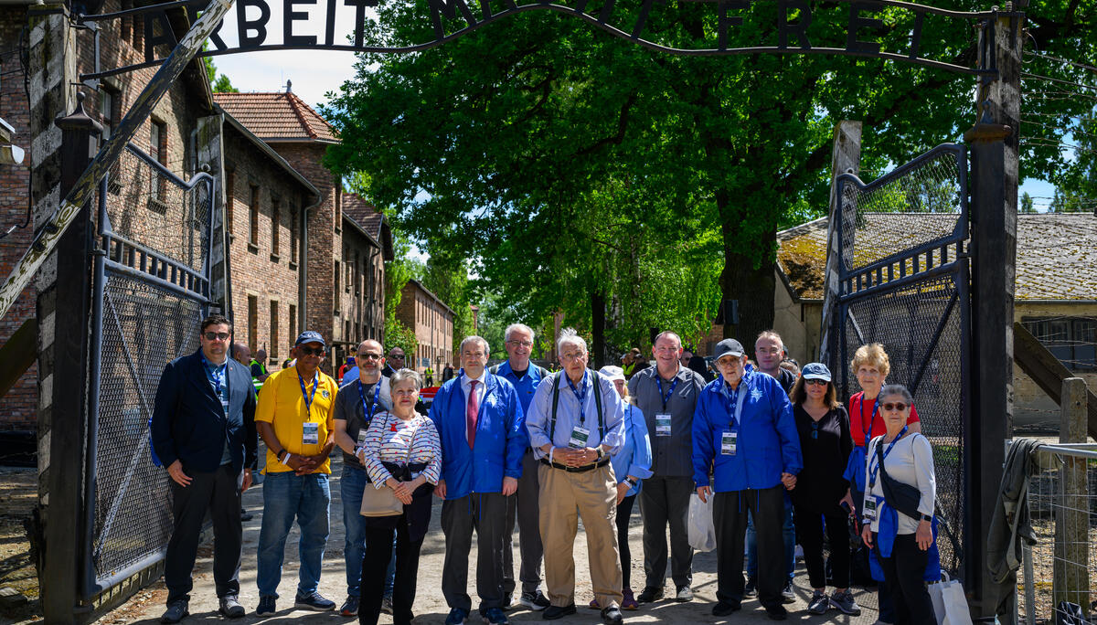 YU President Berman (center) leads a delegation of university presidents to Auschwitz for the 2024 International March of the Living
