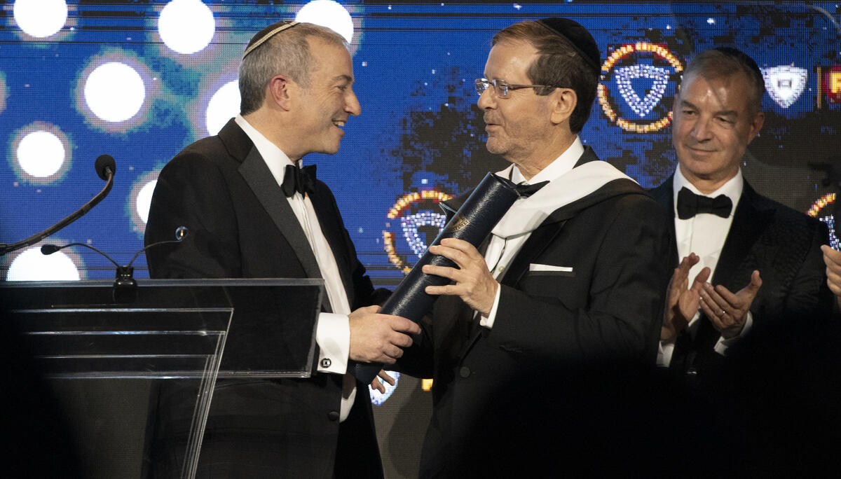 President of Israel, Isaac Herzog, being presented with an honorary doctorate by Rabbi Dr. Ari Berman, president of Yeshiva University, at the university's 101st annual Hanukkah Dinner on Dec. 7, 2025.