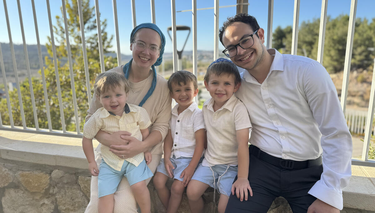 YU Graduate Moshe Pahmer, pictured at right with his family, has been enjoying the Reichman program and life in Israel.