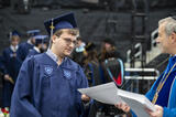 Samuel Halpern receives his diploma at Yeshiva University's 95th Annual Commencement.
