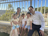 YU Graduate Moshe Pahmer, pictured at right with his family, has been enjoying the Reichman program and life in Israel.