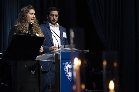 Yeshiva University students Lior Morgenshtern and Mendy Kanofsky, who both previously served in the IDF, introduce the prayer for the State of Israel and a misheberach [prayer for healing] for those currently fighting for Israel.