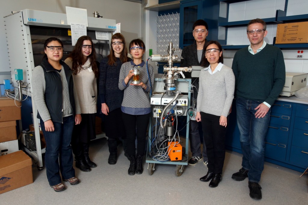 Anatoly Frenkel, right, with students