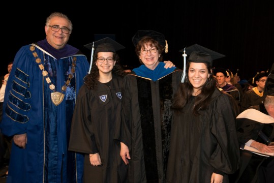 President Joel with President is Rivka Pahmer. On my other side is Chevie Ayden Pahmer.