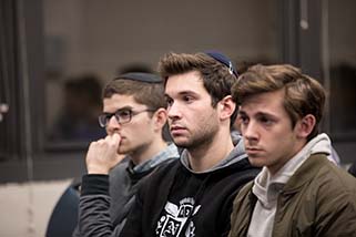 YU students attending Kristallnacht comemoration