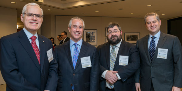 (l-r): Seymour Liebman, Andrew J. Lauer, Rabbi Daniel Feldman, Lawrence Burian