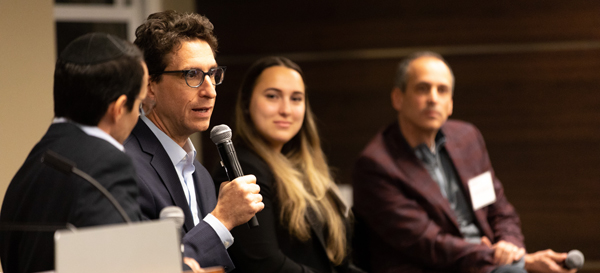 Panel participant. Left to right: Laizer Kornwasser, David Schatsky, Melanie Shapsis and Moshe Bellows