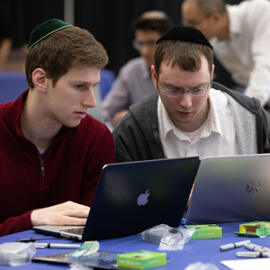 Two students work with AdaCore programming language