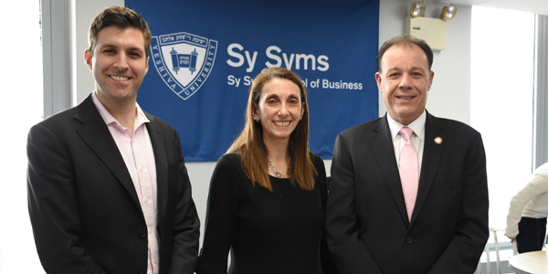 Group photo: (l-r): Jon Greenfield, director of government relations; Debra Pine; Mark Gjoanj