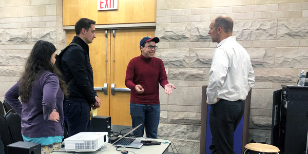 Dan Beaudry speaks with international students