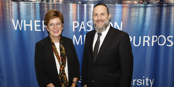 Danielle Wozniak and Rabbi Elazer Meisels