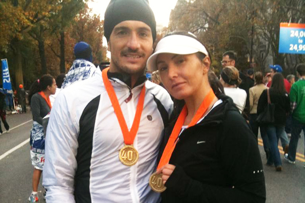 Simone and Barbara side by side wearing their medals