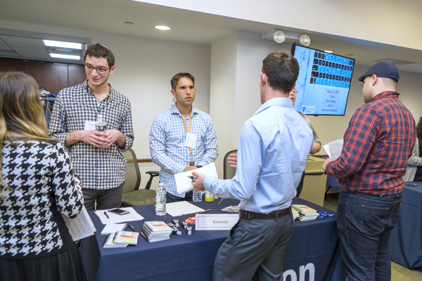 Recruiters from Amazon meet with interested students