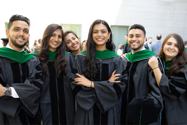 Picture of six Einstein grads in group shot