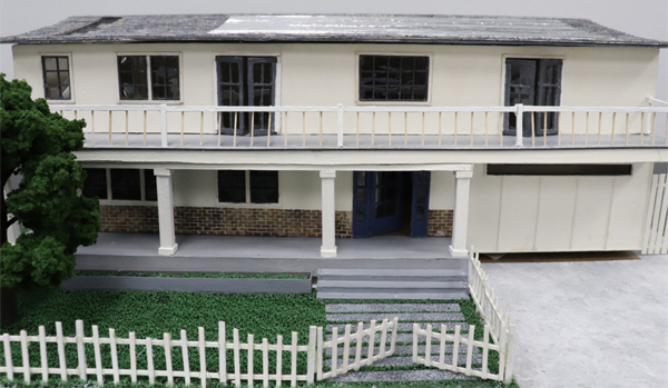 Model of a two-story house by Chana Tropper